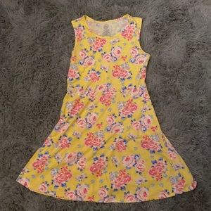 A girls dress XXL (girls) yellow with multi color flowers